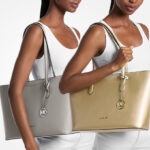 A Woman Wearing Michael Kors Arden Large Top Zip Tote Bags