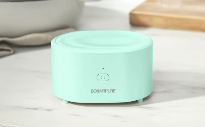 Conair Portable Air Purifier at Kitche Table