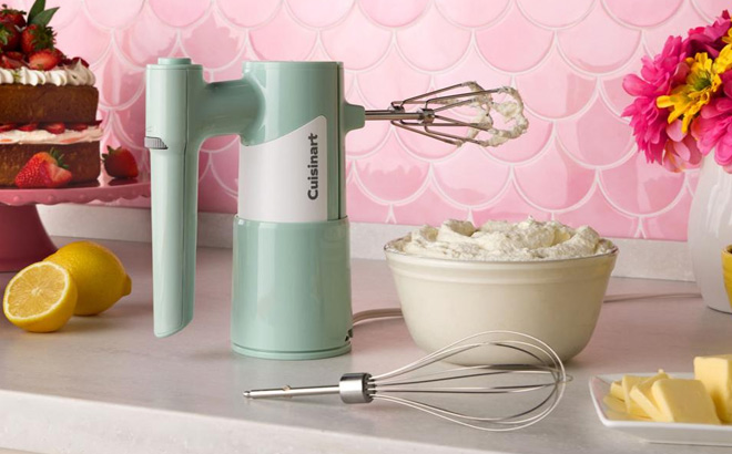 Cuisinart 5 Speed Hand Mixer with Storage Case on the Table