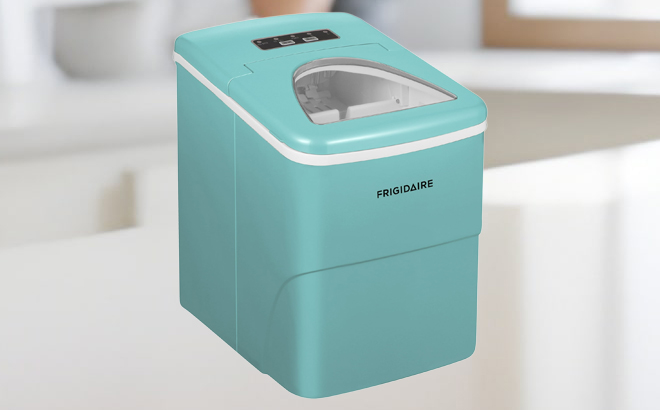 Frigidaire Portable Countertop Ice Maker in Blue Color on a Kitchen Counter Frigidaire Portable Countertop Ice Maker in Blue Color on a Kitchen Counter