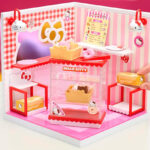 MGAs Miniverse Make It Mini Spaces Hello Kitty Building Set on a Table