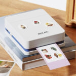 Nelko Mini Portable Printer on the Table