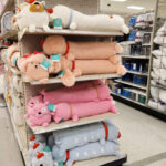 Pillowfort Poodle Kids Long Weighted Plush Throw Pillows on a Shelf