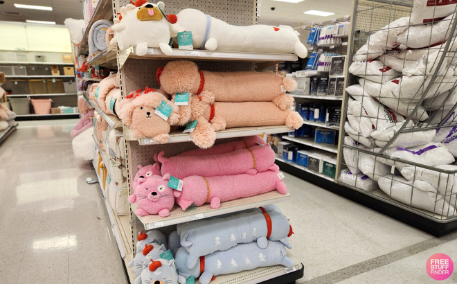 Pillowfort Poodle Kids Long Weighted Plush Throw Pillows on a Shelf