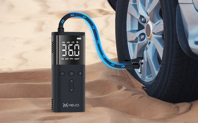 Tire Inflator Portable Air Compressor on the Sand