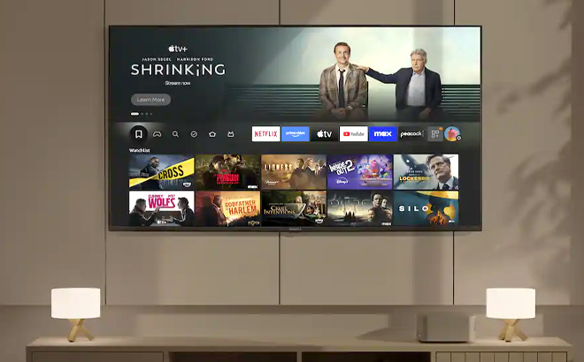 nsignia 70 Inch Class F50 Series LED 4K UHD Smart Fire TV on a Wall