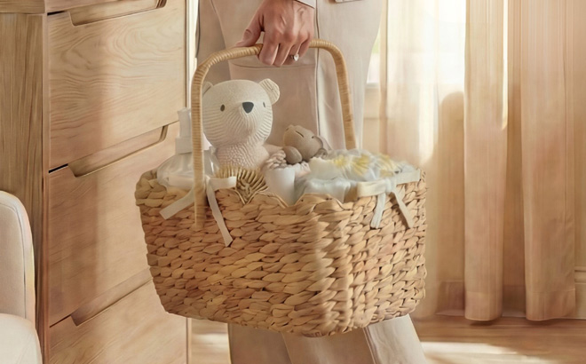 A Person Carrying a Best Choice Products Diaper Caddy Organizer