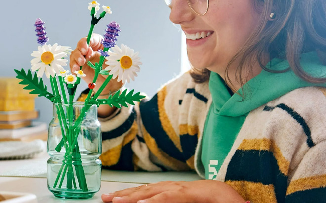 A Person Decorating with LEGO Flowers