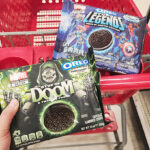 A Person Holding Oreo Marvel Stuf of Doom Chocolate Sandwich Cookies
