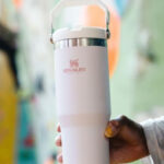 A Person Holding Stanley IceFlow Flip Straw Tumbler with Handle