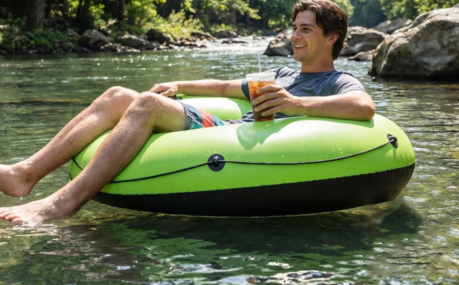 A Person Sitting in the Ozark Trail Green 39 Inch River Tube A Person Sitting in the Ozark Trail Green 39 Inch River Tube