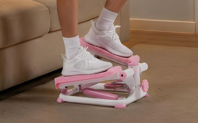 A Person Using Sunny Health Fitness Mini Steppers
