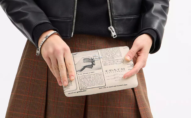 Coach Outlet Large Corner Zip Wristlet With Newspaper Print