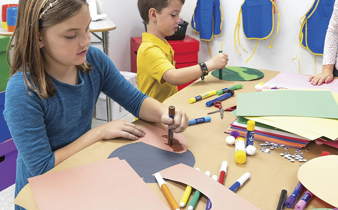Kids Doing Crafts Using Construction Papers