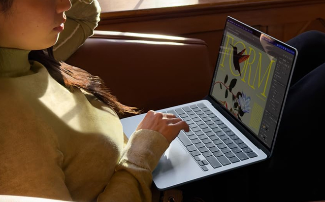 Person Using MacBook 2026 13 6 Inch Laptop