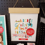11x14 Wood Hanger Board Print on a Shelf at Walgreens