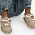 A Girl Wearing UGG Lo Lowmel Shoes
