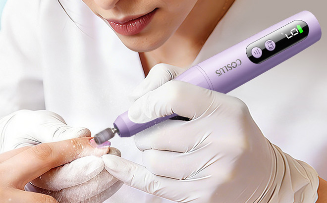 A Person Holding Coslus Electric Cordless Nail Drill