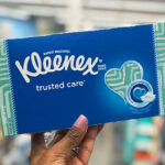 A Person Holding the Kleenex Trusted Care Facial Tissues Box at CVS