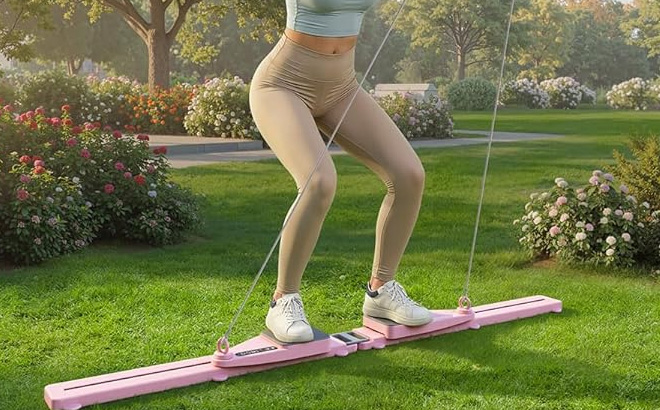A Person Using Pilates Reformer Set