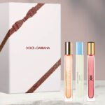 Dolce Gabbana 3 Piece Travel Spray Set on a Marble Tabletop