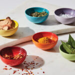 Le Creuset 6 Piece Stoneware Multi Color Pinch Bowls Set on the Table