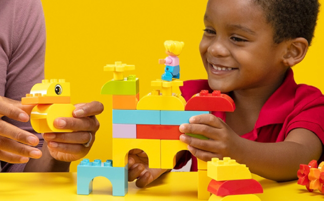 A Kid Participating in a Free LEGO Little Builders Class A Kid Participating in a Free LEGO Little Builders Class