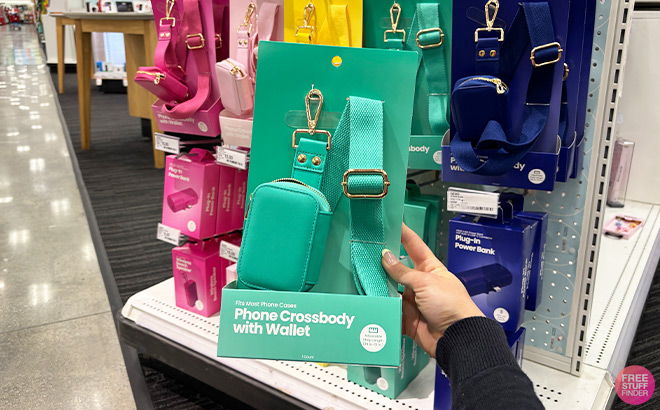 A Person Holding GEMS Crossbody Phone Strap with Wallet in Green Color