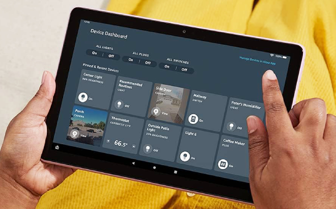 A Person Holding a Amazon Fire HD 10 Tablet