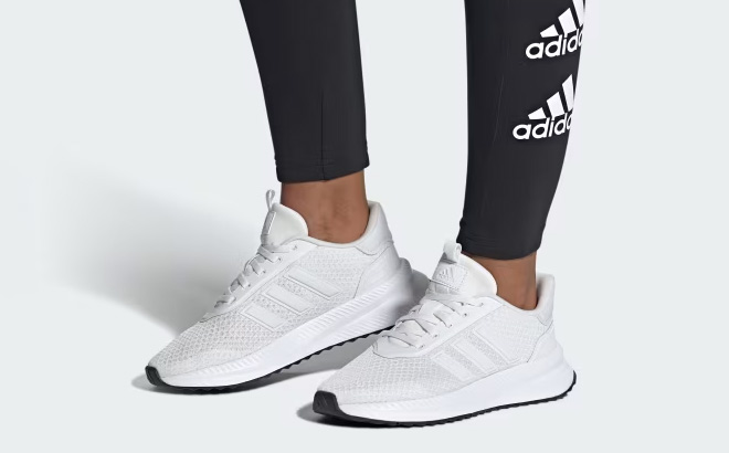 A Person Wearing Adidas X PLR Path Shoes