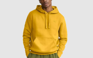 A Person Wearing Champion Mens Long Sleeve Hoodie