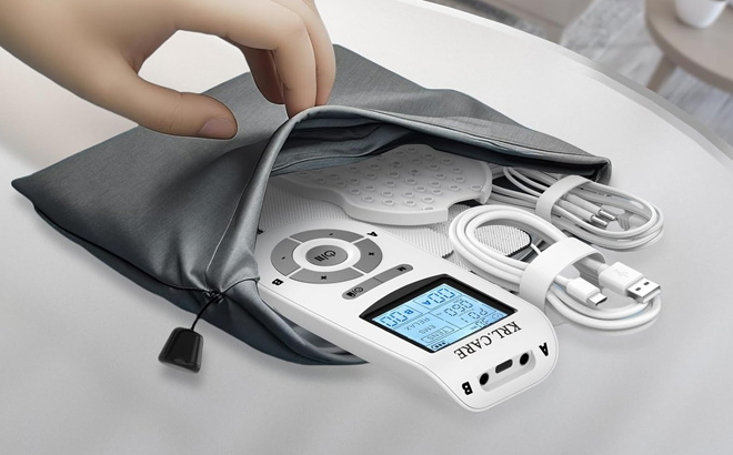KRL CARE Dual Channel TENS EMS Muscle Stimulator on a Table