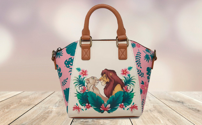 Loungefly Disney The Lion King Simba Nala Tropical Mini Satchel Bag on the Table