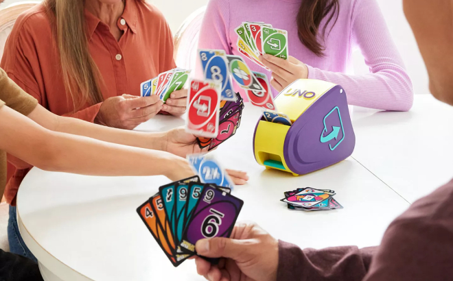 A Family Playing with Mattel UNO Flip Attack Card Game A Family Playing with Mattel UNO Flip Attack Card Game