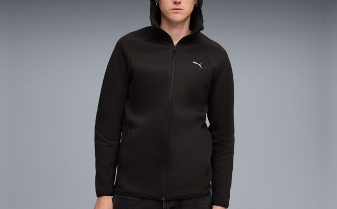 A Man Wearing Puma Evostripe Hoodie in Black A Man Wearing Puma Evostripe Hoodie in Black