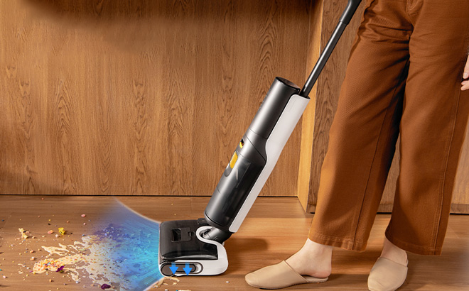 A Person Using Roborock F25 BX Wet Dry Vacuum Cleaner