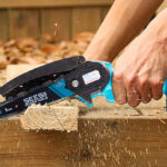 A Person Using Seesii Mini Chainsaw