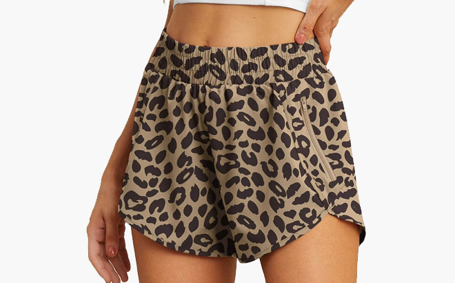 A Person Wearing Cueply Womens Running Shorts in LD Khaki Color