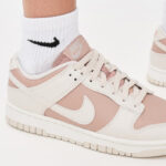 A Person Wearing Nike Dunk Low Next Nature Sneakers