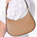 A Woman Holding Kate Spade Paige Shoulder Bag