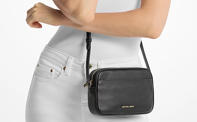 A Woman Wearing Michael Kors Jet Set Small Pebbled Leather Camera Crossbody Bag A Woman Wearing Michael Kors Jet Set Small Pebbled Leather Camera Crossbody Bag