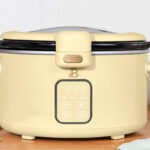 Beautiful 4 Qt Digital Slow Cooker with Hinged Locking Lid in Buttercream