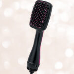 Revlon One Step Hair Dryer and Styler Brush on Neutral Background