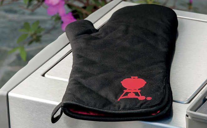 Weber Barbecue Mitt on a Table