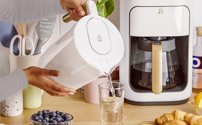 A Person Holding Beautiful by PUR 12 Cup Water Filtration Pitcher