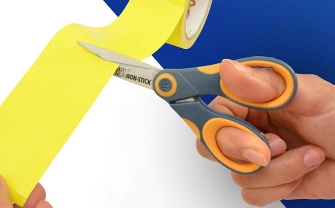 A Person Holding Westcott 5 inch Non Stick Titanium Scissors