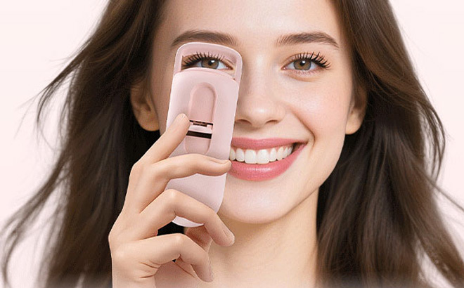 A Person Using Dududu Heated Eyelash Curler