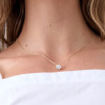 A Person Wearing Banana Republic Cubic Zirconia Solitaire Necklace