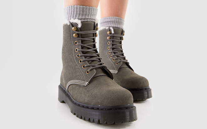 A Person Wearing Dr Martens 1460 Pascal Bex Faux Fur Lined Boots A Person Wearing Dr Martens 1460 Pascal Bex Faux Fur Lined Boots