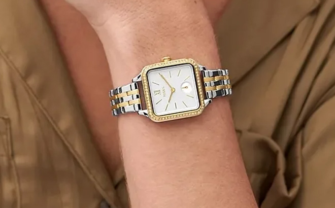 A Person Wearing Fossil Womens Colleen Three Hand Two Tone Stainless Steel Watch